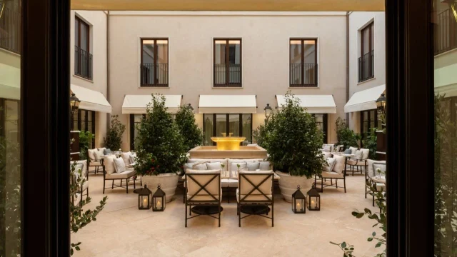 Luxury Corinthia Hotel exterior facade showcasing elegant architecture and sophisticated design for premium travellers.