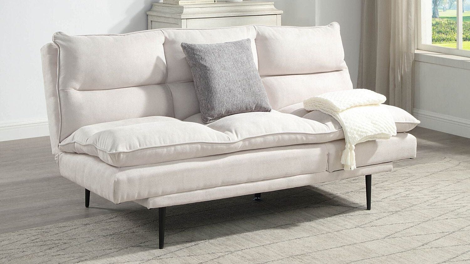 OAT Home interior design featuring minimalist furniture and neutral colour palette for a modern living space.