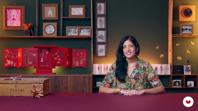 A creative professional engaging with a Domestika online course on a laptop, showcasing digital learning and skill growth.