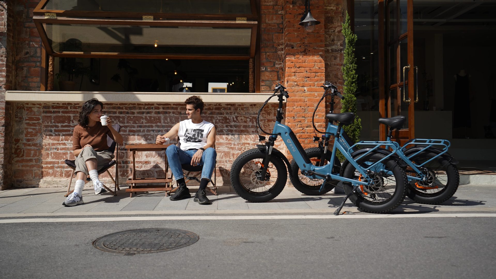A sleek DYU electric bike parked in a modern urban centre, showcasing premium design and sustainable travel features.