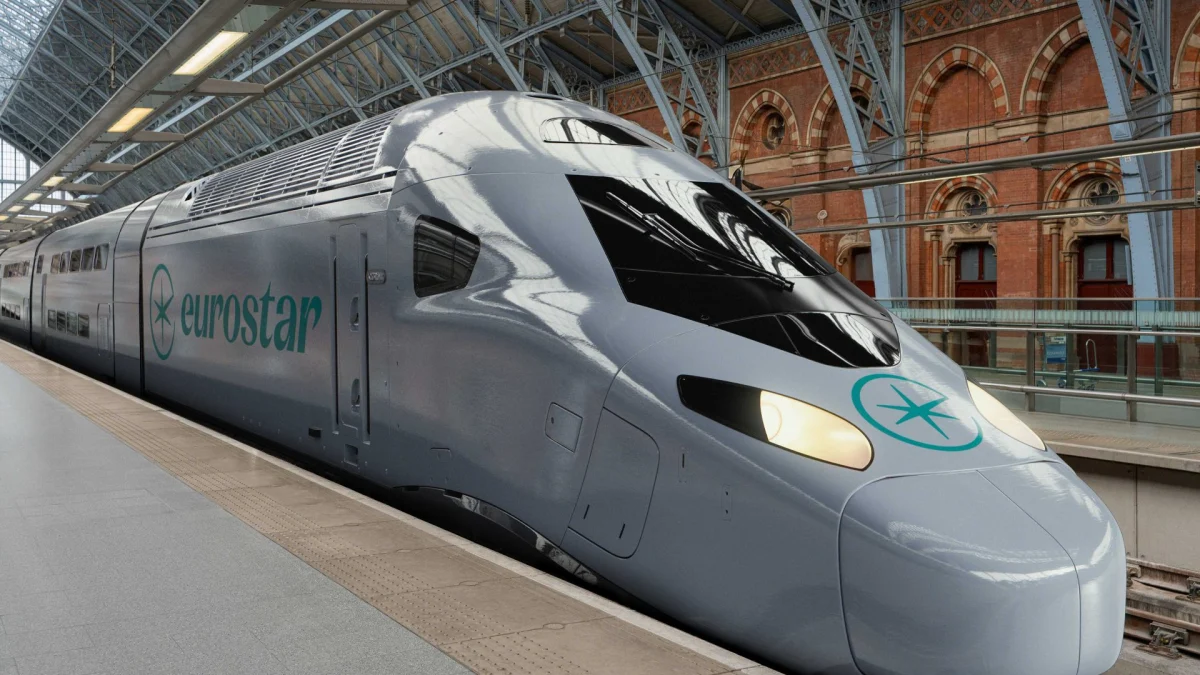 Eurostar high-speed train arriving at St Pancras International station in London for European travel.