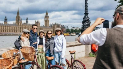 Evan Evans Tours coach travelling past iconic London landmarks for sightseeing tours and travel experiences.