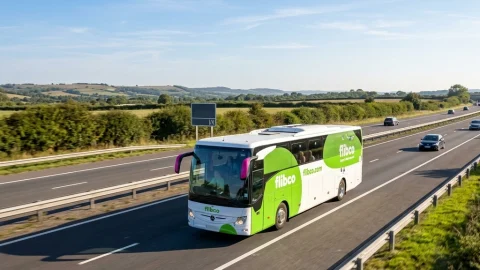 Flibco coach travelling to Stansted Airport, a budget-friendly alternative to the Stansted Express train service.