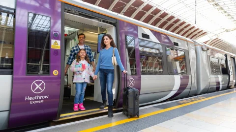 Heathrow Express train arriving at the station platform, offering a fast and reliable rail link to central London.