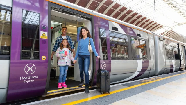 Heathrow Express train arriving at the station platform, offering a fast, reliable travel link to central London.