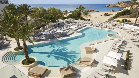 Luxury Insotel Hotel Group resort exterior featuring modern architecture, swimming pools, and Mediterranean gardens.
