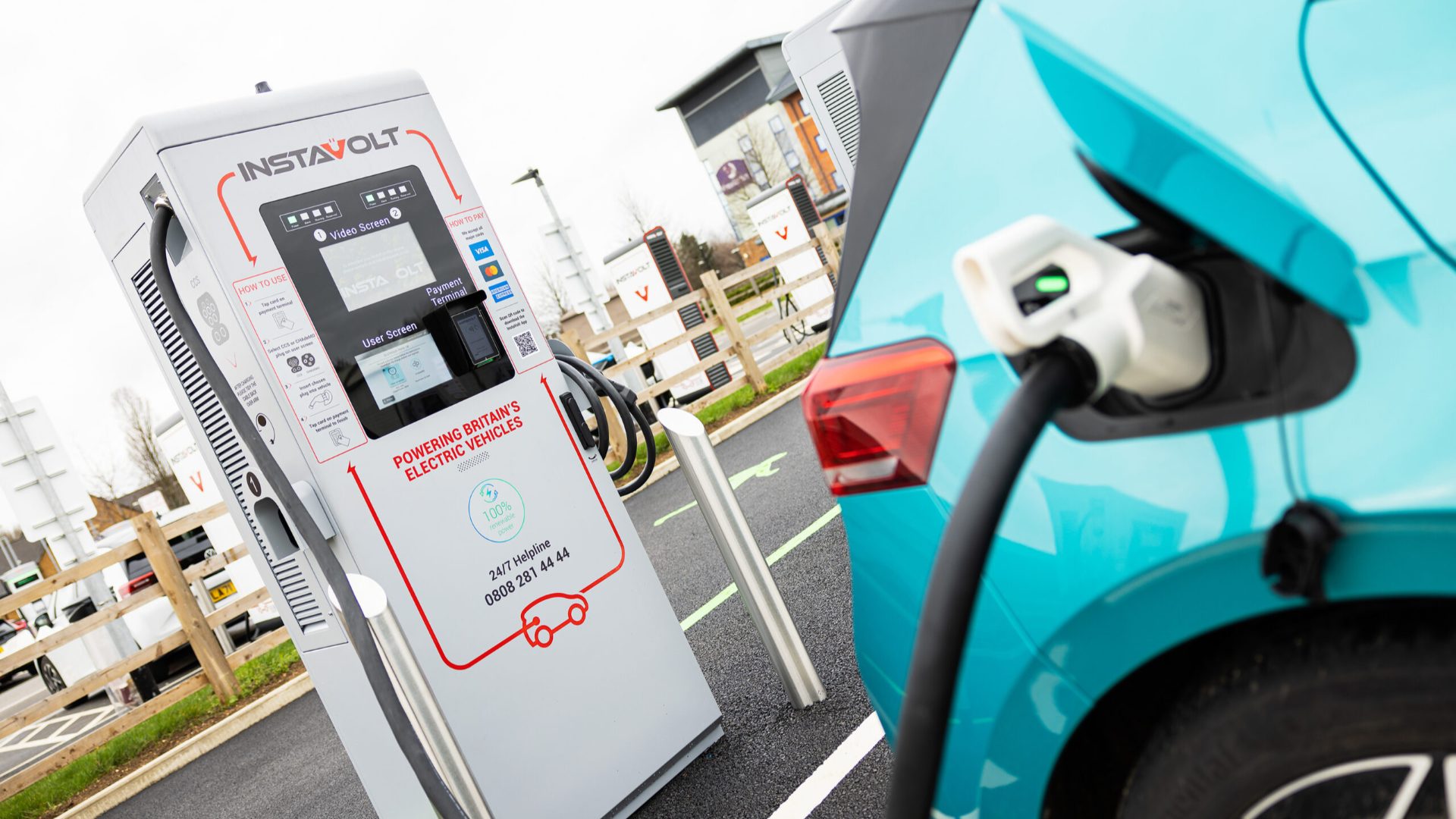 InstaVolt electric vehicle charging station at a modern UK service centre for rapid EV charging and sustainable travel.