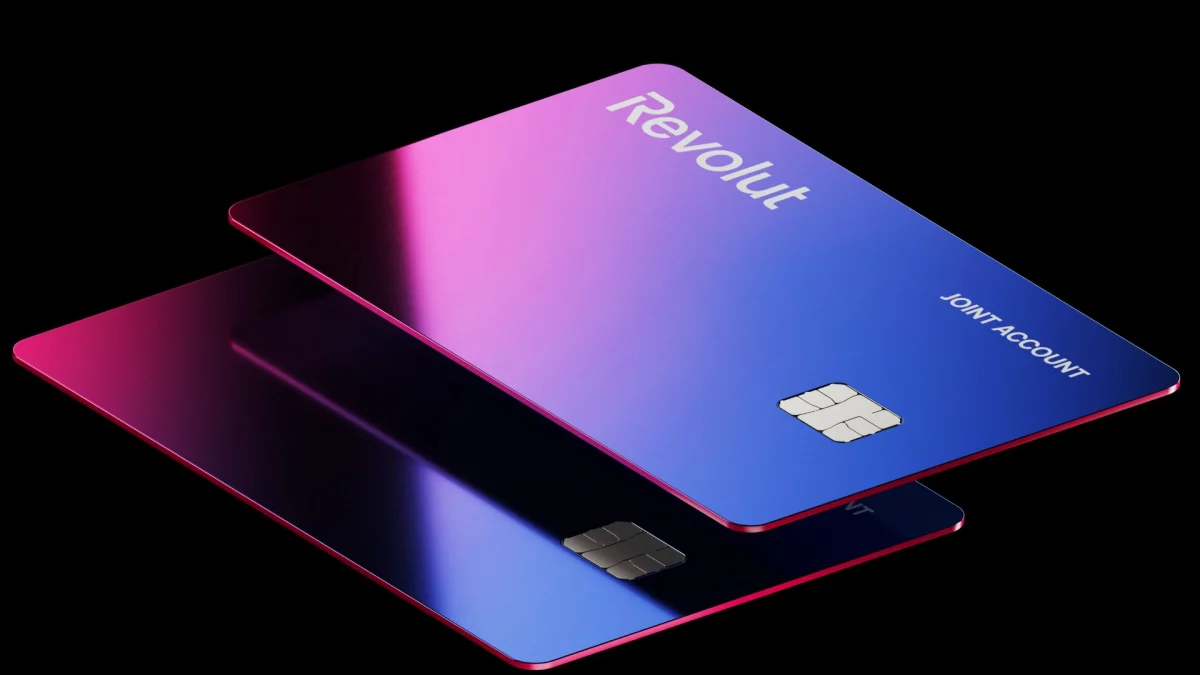 Revolut mobile app interface on a smartphone screen showing digital banking features and savings account overview.