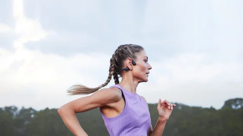 Shokz bone conduction headphones displayed on a clean surface, ideal for sports and fitness tracking with premium audio.
