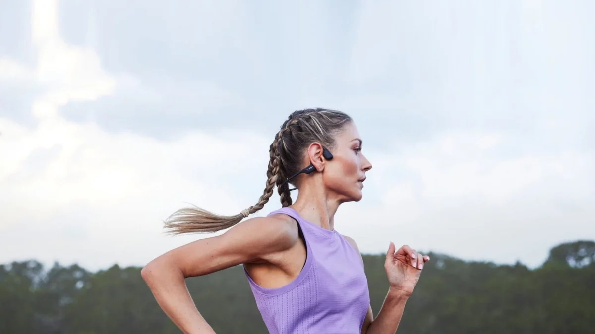 Shokz bone conduction headphones displayed on a clean surface, ideal for sports and fitness tracking with premium audio.