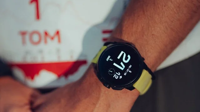 Suunto sports watch displayed on a rugged outdoor trail, highlighting premium GPS features and durable design.