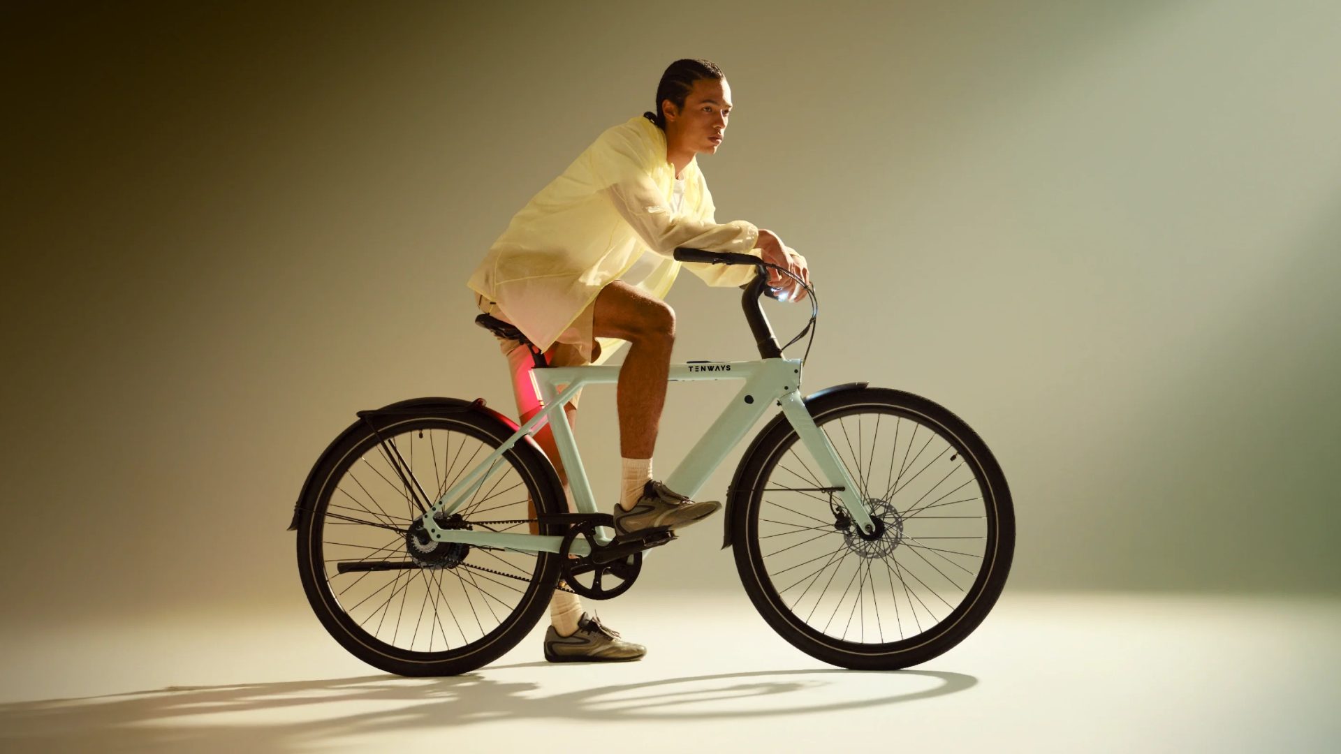 Tenways electric bike parked in a modern urban centre, showcasing sleek design and premium cycling technology.