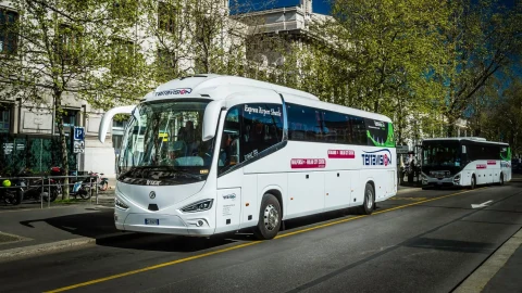 Terravision airport transfer bus parked at a modern transport centre, representing affordable travel and coach services.
