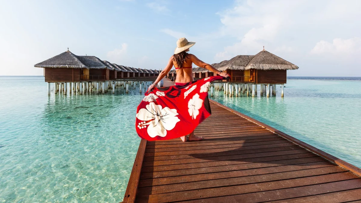 Virgin Atlantic Holidays luxury beach resort with turquoise sea, perfect for booking your next dream holiday getaway.