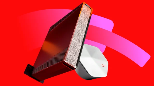Virgin Media broadband router and fibre optic cables on a desk, representing high-speed internet deals and connectivity.