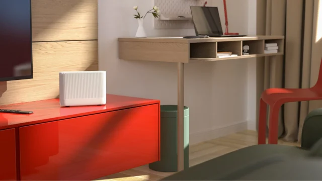 Vodafone UK fibre broadband router on a desk, representing high-speed home internet connectivity and digital services.