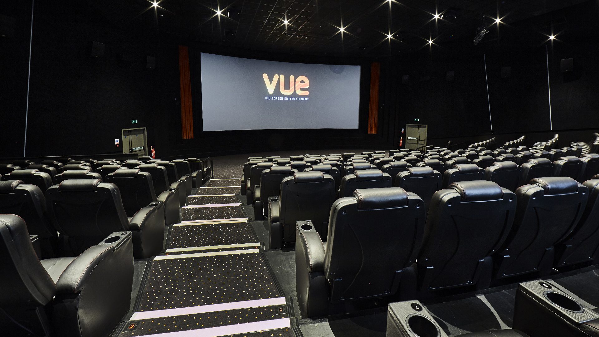 Vue Cinema auditorium with comfortable seating and a large screen for an immersive film viewing experience.