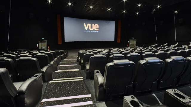 Vue Cinema auditorium with comfortable seating and a large screen for an immersive film viewing experience.