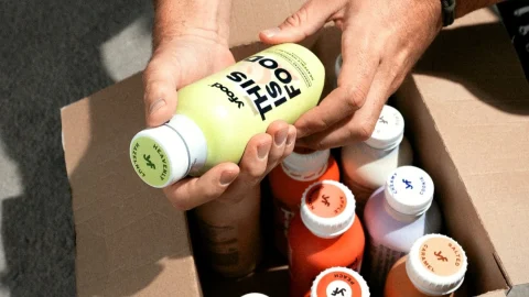 Yfood meal replacement drinks and bars arranged on a table, representing healthy, convenient nutrition for busy lifestyles.