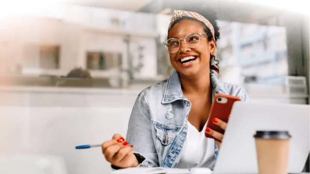 Your Co-op Broadband high-speed internet connection on a laptop screen with a modern home office background.