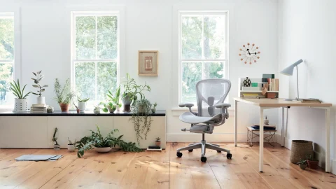 Herman Miller ergonomic office chair in a modern workspace, showcasing premium design and comfort for home offices.